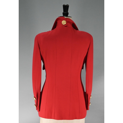 1188 - A Chanel Boutique jacket in red wool, long line with double collar, single breasted with four open p... 