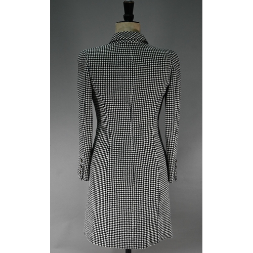 1190 - A Chanel Boutique coat dress in black and white houndstooth check wool, with high collar and small C... 