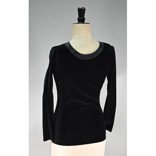 1191 - Chanel - A black velvet fitted evening top with Chanel motif zip fastening to length of back and cuf... 