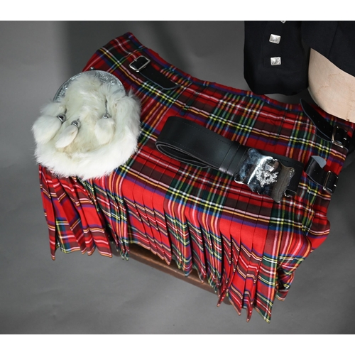 1199 - A pair of grey tartan trousers by the Kilt Society, 46R; two tartan kilts, size 46/48 amd 48 and c/w... 