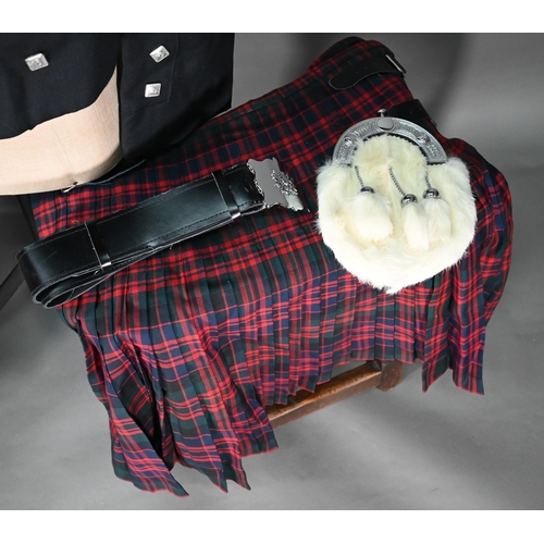 1199 - A pair of grey tartan trousers by the Kilt Society, 46R; two tartan kilts, size 46/48 amd 48 and c/w... 