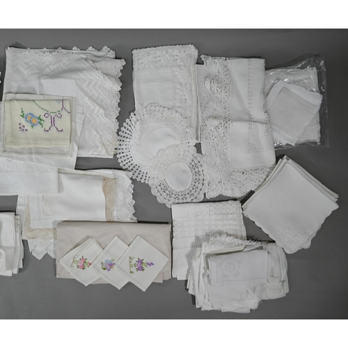 1201 - Box of assorted textiles including embroidered tablewares, doilies, dark green table cloths and vari... 