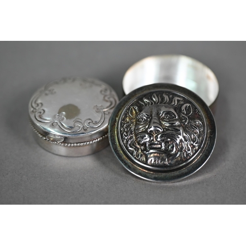 1219 - Two Continental silver small pill-boxes, one embossed with lion-mask (2)