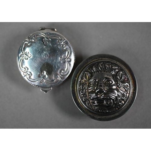 1219 - Two Continental silver small pill-boxes, one embossed with lion-mask (2)