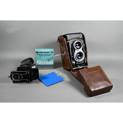 1223 - A Rolleiflex twin-lens reflex camera with Synchro-Compur lens, in leather case with trigger-handle, ... 