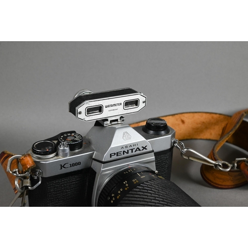 1224 - A boxed Halina AI twin lens reflex camera, to/w two Asahi Pentax K1000 slr cameras with Tokina S2-X ... 