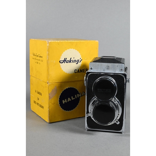 1224 - A boxed Halina AI twin lens reflex camera, to/w two Asahi Pentax K1000 slr cameras with Tokina S2-X ... 