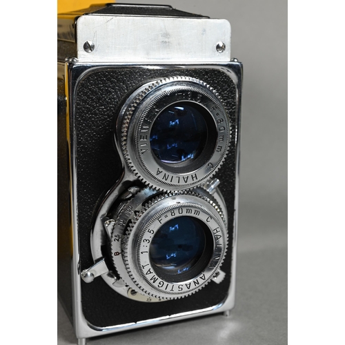 1224 - A boxed Halina AI twin lens reflex camera, to/w two Asahi Pentax K1000 slr cameras with Tokina S2-X ... 