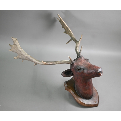 1231 - A composite fallow deer's head on shield, with real antlers