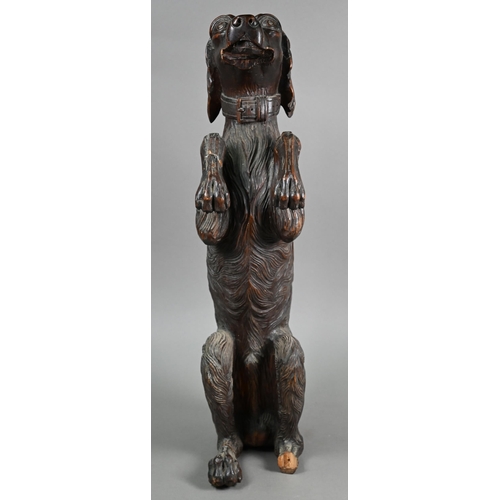 1235 - A Black Forest carved wood begging dog, 60 cm high (one foot missing, the others repaired, lower jaw... 