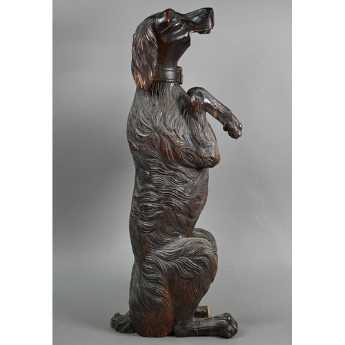 1235 - A Black Forest carved wood begging dog, 60 cm high (one foot missing, the others repaired, lower jaw... 