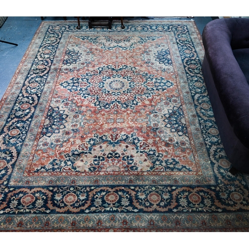 806 - An Indo-Persian Tabriz carpet, the blue/coral ground centred by a floral medallion 356cm x 269cm