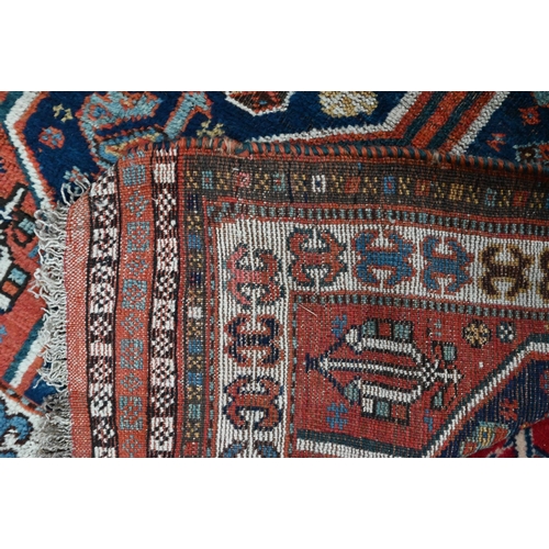 813 - An antique Southern Caucasus rug, the blue ground with twin lozenge pole design, 135 cm x 90 cmProve... 