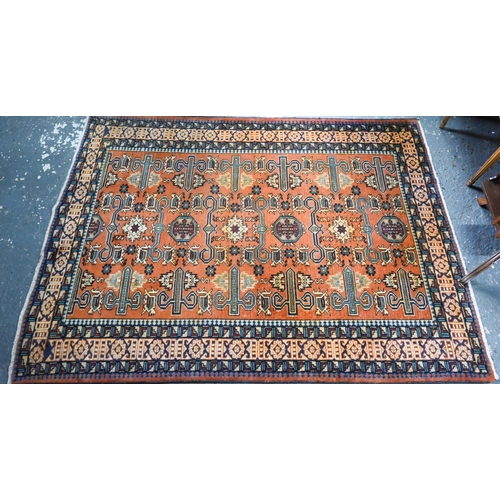 814 - A fine North West Persian Ardebil rug, coral ground, 188 cm x 140 cm