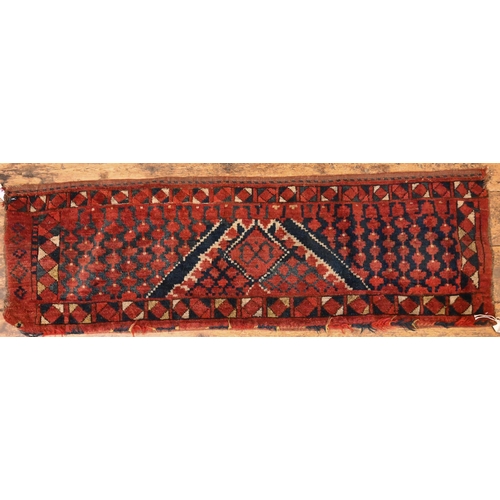 820 - An antique Afghan Turkoman red ground geometric design bag face, 144 cm x 47 cm