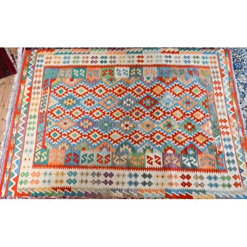 829 - A contemporary Anatolian Kilim, multi-coloured geometric design, 289 cm x 204 cm