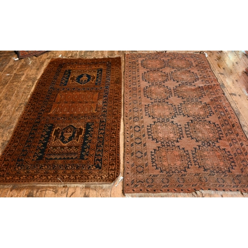 836 - An old Afghan brown-red ground gul design rug, 207 cm x 117 cm to/with an old Belouch rug, brown-red... 