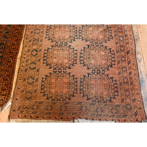 836 - An old Afghan brown-red ground gul design rug, 207 cm x 117 cm to/with an old Belouch rug, brown-red... 