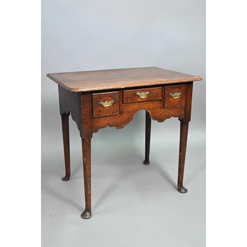 839 - An 18th century oak three drawer side table, raised on turned legs to pad feet, 76 cm w x 51 cm x 71... 