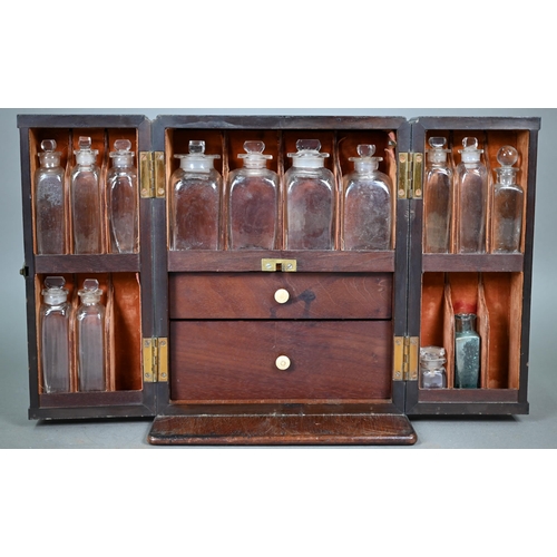 842 - A George III mahogany apothecary box, the top with recessed brass carrying handle over a pair of doo... 