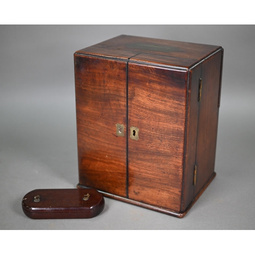 842 - A George III mahogany apothecary box, the top with recessed brass carrying handle over a pair of doo... 