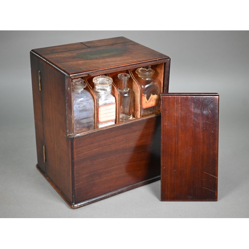 842 - A George III mahogany apothecary box, the top with recessed brass carrying handle over a pair of doo... 