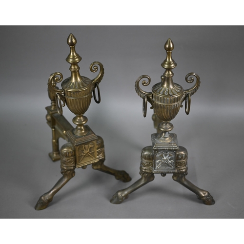 844 - A pair of cast brass Neo-Classical style urn finial chevets / fire dogs raised on front hoof feet, 4... 