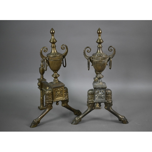 844 - A pair of cast brass Neo-Classical style urn finial chevets / fire dogs raised on front hoof feet, 4... 