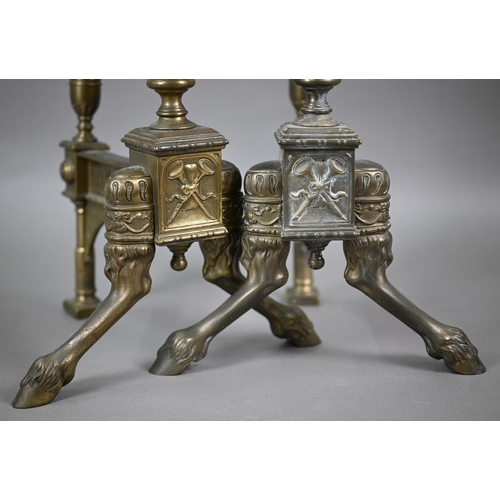 844 - A pair of cast brass Neo-Classical style urn finial chevets / fire dogs raised on front hoof feet, 4... 