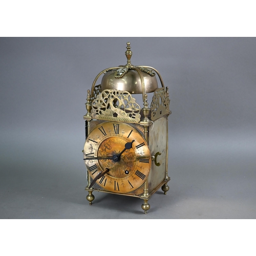 845 - A large brass 17th century style lantern clock, the engraved dial signed Thomas Madge, with two trai... 