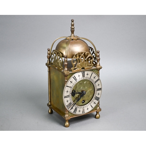 846 - A small traditional brass Smiths lantern style clock, with Roman Numeral engraved silvered dial, the... 