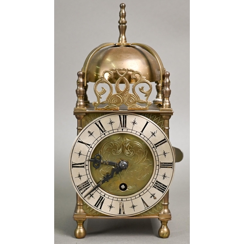 846 - A small traditional brass Smiths lantern style clock, with Roman Numeral engraved silvered dial, the... 