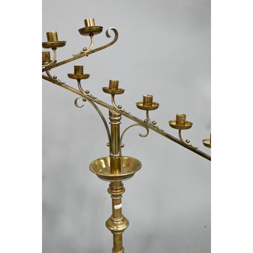 849 - A large pair of antique brass candelabra, the single socket with detachable nine arm sockets, on tur... 