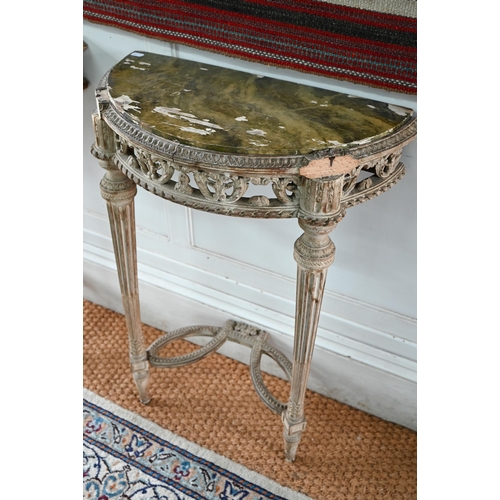 854 - A pair of antique continental carved lime wood demi-lune console tables, the (loose) tops with aged ... 