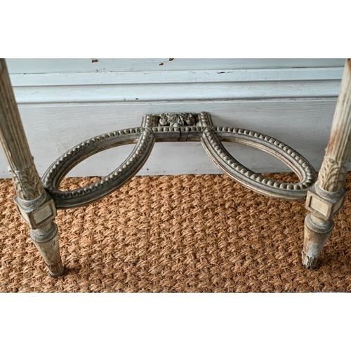 854 - A pair of antique continental carved lime wood demi-lune console tables, the (loose) tops with aged ... 