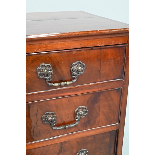 855 - A George III mahogany chest of four long graduated drawers, with later cast brass fittings, raised o... 