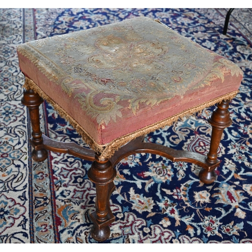 857 - A Queen Anne style walnut framed stool, 19th century, with distressed overstuffed needlepoint seat, ... 