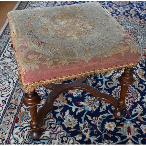 857 - A Queen Anne style walnut framed stool, 19th century, with distressed overstuffed needlepoint seat, ... 