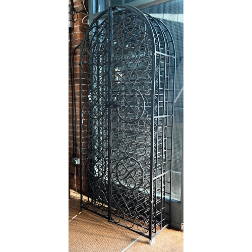 860 - A substantial wrought iron dome-top wine cage for approx. 130 bottles, with twin doors, 93 cm w x 20... 