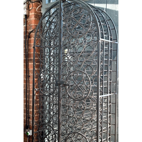 860 - A substantial wrought iron dome-top wine cage for approx. 130 bottles, with twin doors, 93 cm w x 20... 