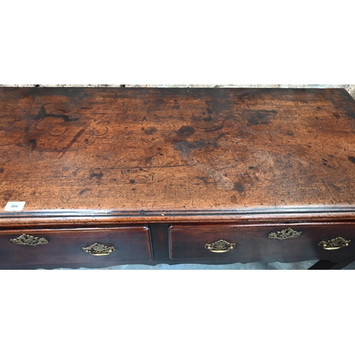 866 - An 18th century oak low dresser, the wide single plank top over three drawers within a shaped apron,... 