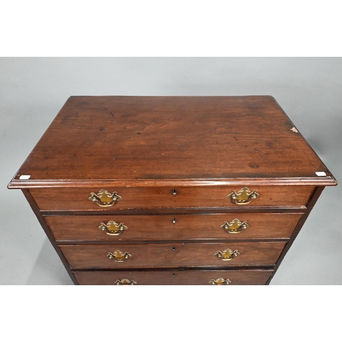 868 - A George III mahogany chest of four long graduated drawers, later brass fittings, raised on shaped b... 