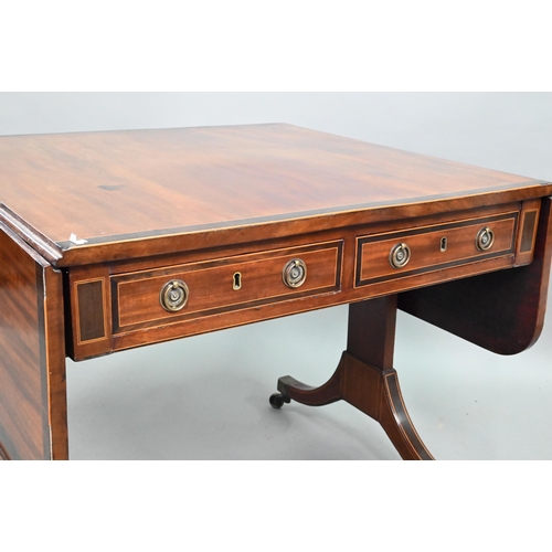 873 - A good Regency rosewood cross-banded mahogany sofa table, the rounded drop leaves over two frieze dr... 