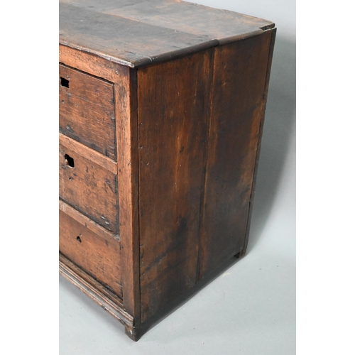 878 - A rustic late 17th/18th century joined oak framed six drawer chest, raised on stile feet, probably N... 