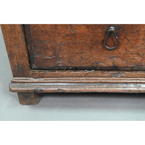 878 - A rustic late 17th/18th century joined oak framed six drawer chest, raised on stile feet, probably N... 