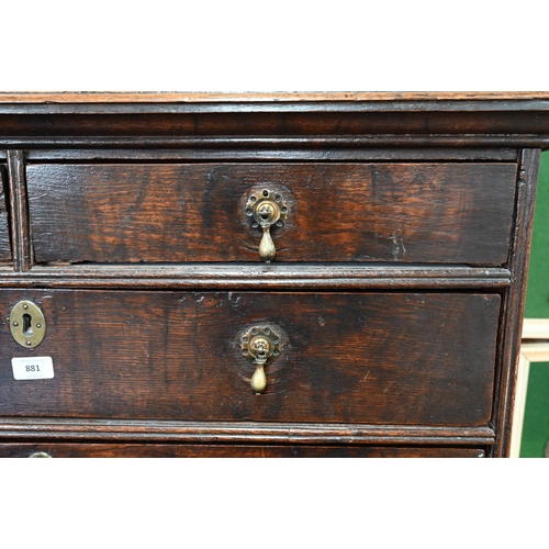 881 - A late 17th/18th century oak chest on stand, the two short over four long graduated drawers with lat... 