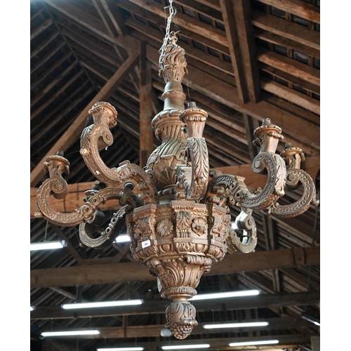 886 - A substantial Italian baroque style carved giltwood and composite eight branch chandelier, 19th cent... 