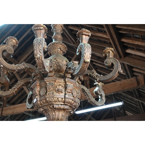 886 - A substantial Italian baroque style carved giltwood and composite eight branch chandelier, 19th cent... 