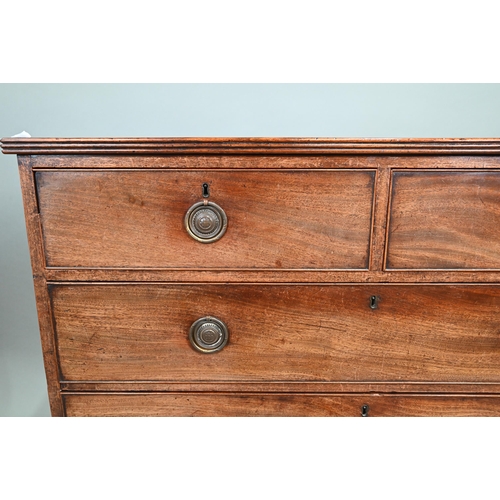 890 - A Georgian mahogany chest of two short over three long graduated drawers, raised on splay bracket fe... 