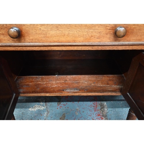 899 - A Victorian mahogany 3/4 galleried sideboard, with an arrangement of three drawers and centred by a ... 